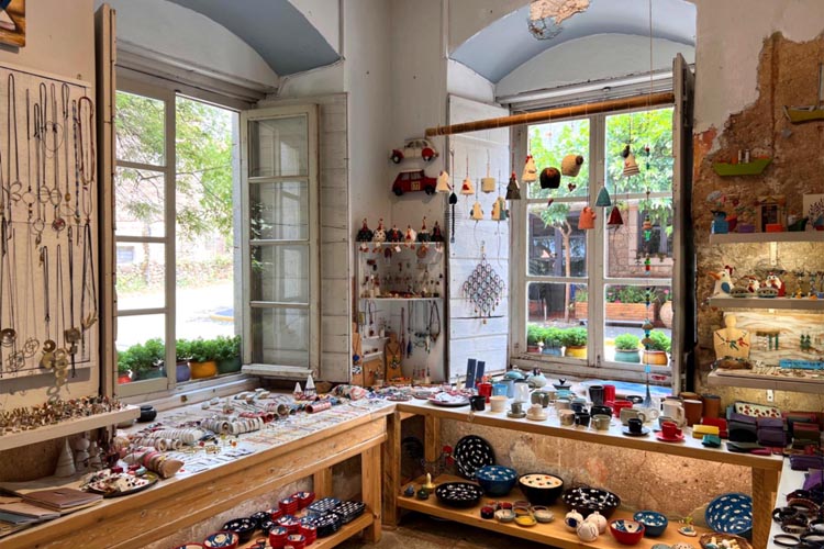 Interior view of RIZA Gift Shop showcasing handmade items in Kardamyli, Mani, Greece